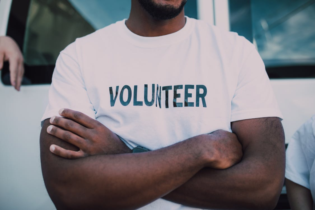 Person wearing volunteer t-shirt